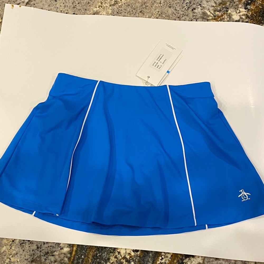 Original Penguin ladies skort, size small, color blue.
